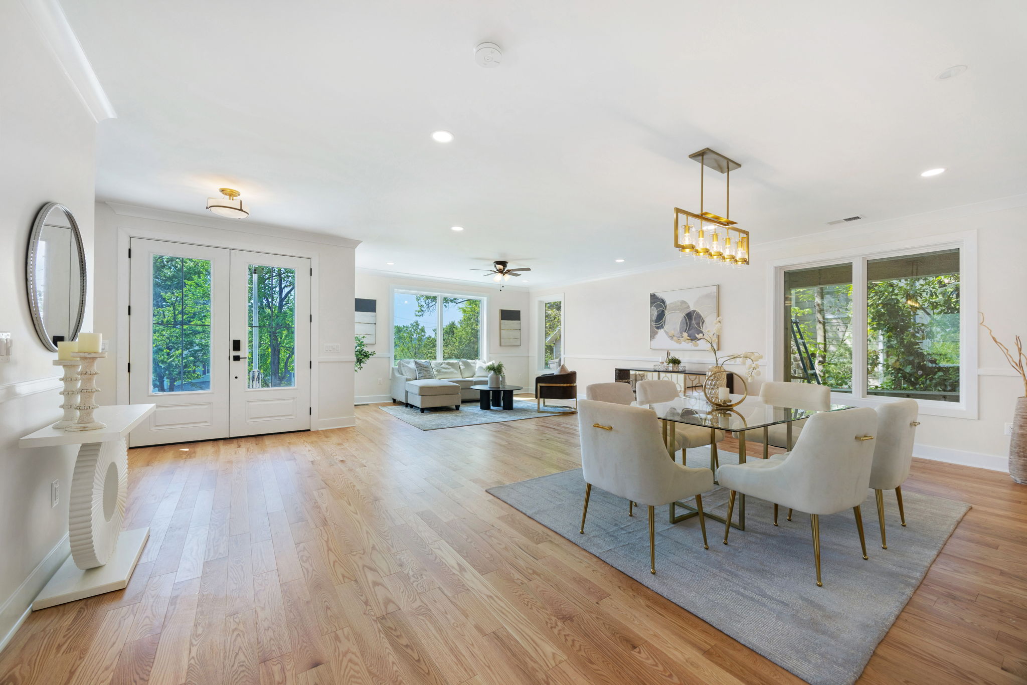 Living and dining spaces with hardwood flooring