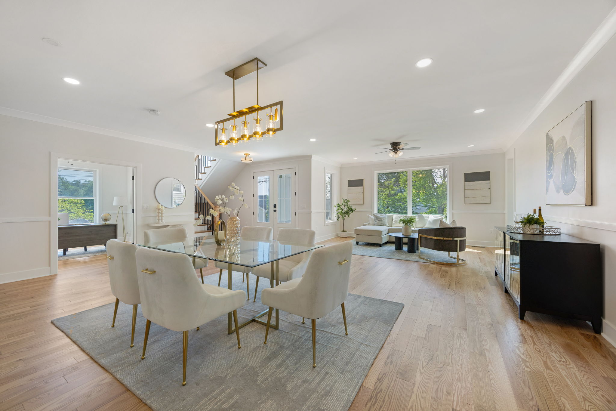 Dining area with windows and pendant lighting